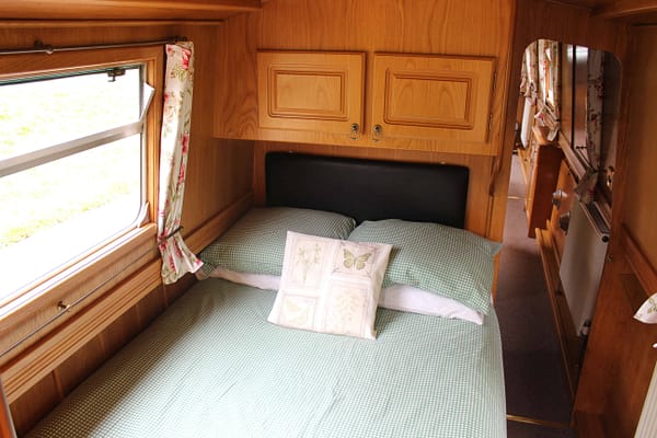 The rear cabin has a fixed double bed